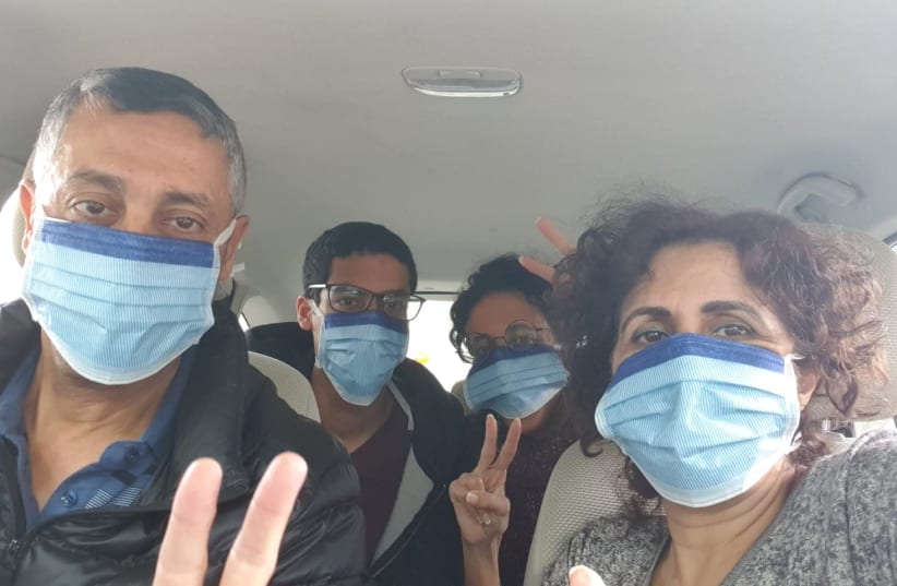 The Kochavi family, under quarantine until Thursday, goes to vote at a coronavirus voting booth in the Knesset elections on March 2 (photo credit: KOCHAVI FAMILY)