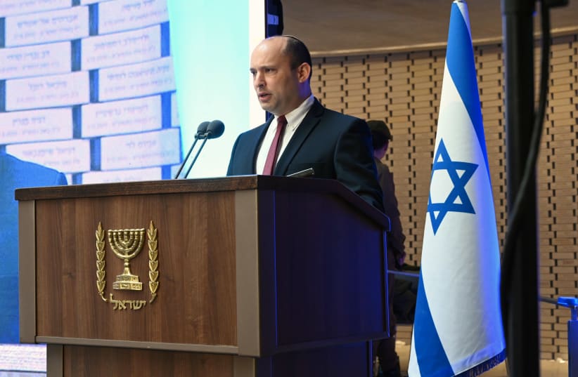 Defence Minister Naftali Bennett speaking at the annual memorial ceremony for soldiers whose burial place is unknown (photo credit: MINISTRY OF DEFENSE SPOKESPERSON'S OFFICE)