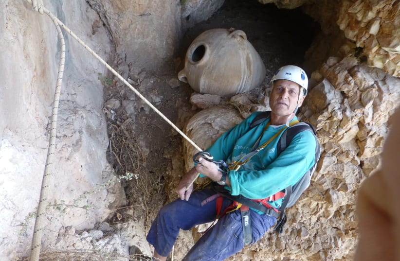 Dr. Yinon Shivtiel at one of the caves used during the Jewish Great Revolt against the Romans as described by Josephus. (photo credit: YINON SHVIETEL)
