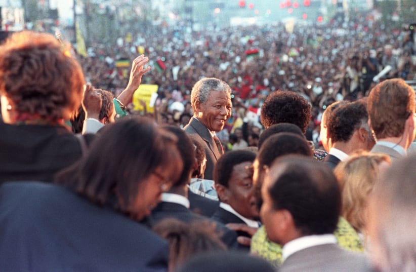 NELSON MANDELA visits Harlem in 1990 (photo credit: REUTERS)