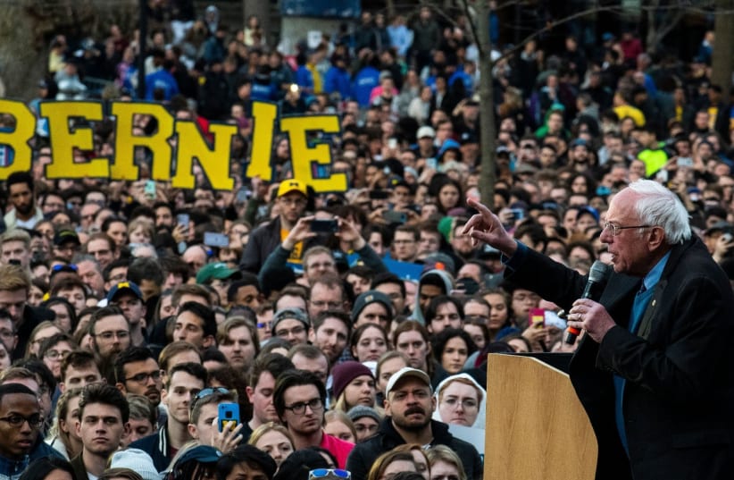 Democratic presidential candidate Bernie Sanders addresses supporters during a campaign rally in Ann Arbor, Mich., March 8, 2020.  (photo credit: GETTY IMAGES)