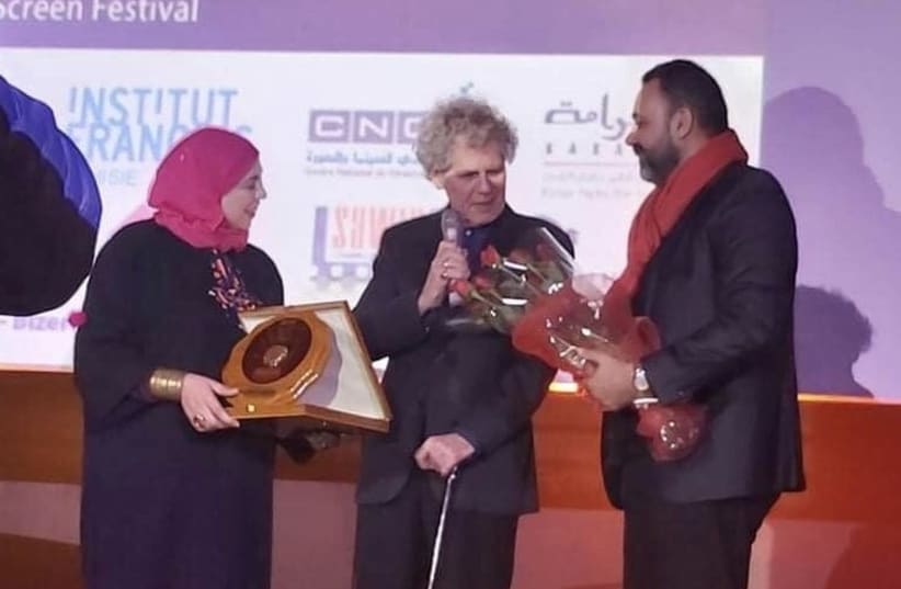 Jack Baxter (center) accepts the 'Prix de l’Espoir’ (Prize of Hope) award at the closing ceremony of the 6th International Human Rights Film Festival of Tunis last month. (photo credit: JACK BAXTER)