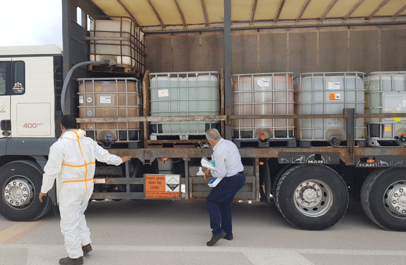 COGAT coordinate the delivery of 20 tons of disinfectant during the coronavirus outbreak (photo credit: COGAT SPOKESPERSON'S UNIT)