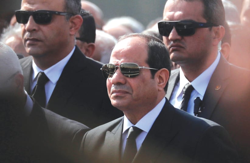 Egyptian President Abdel Fattah al-Sisi attends the funeral of former president Hosni Mubarak (photo credit: AMR ABDALLAH DALSH / REUTERS)