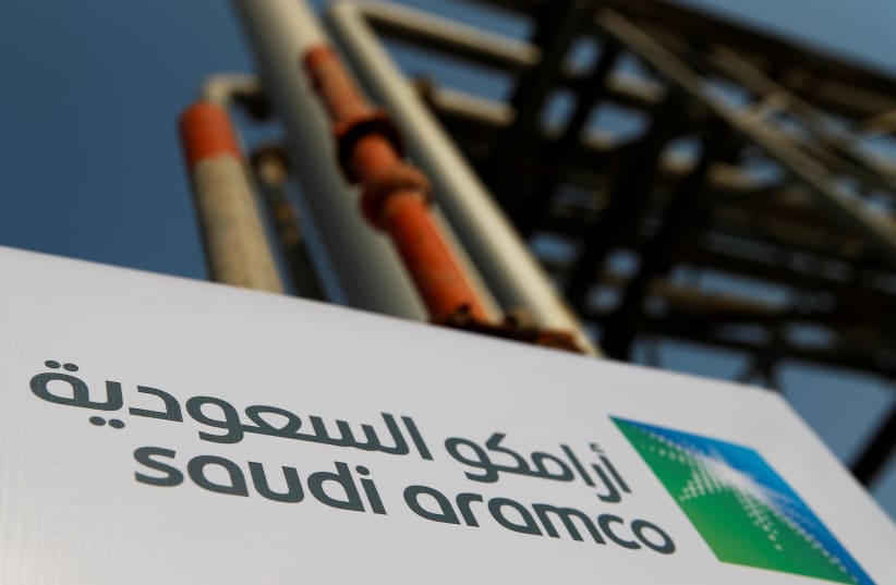 Saudi Aramco logo is pictured at the oil facility in Abqaiq, Saudi Arabia October 12, 2019 (photo credit: REUTERS/MAXIM SHEMETOV)