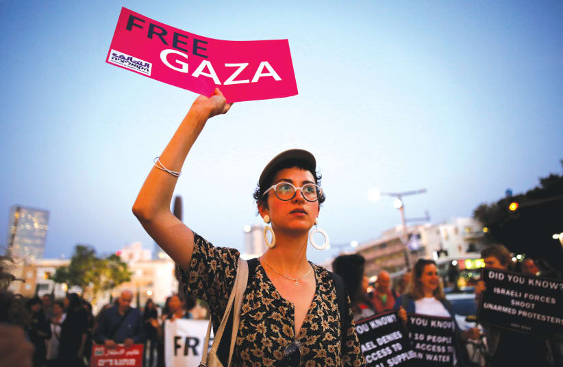 AN ANTI-ISRAEL protester demonstrates against the Eurovision Song Contest. (photo credit: REUTERS)