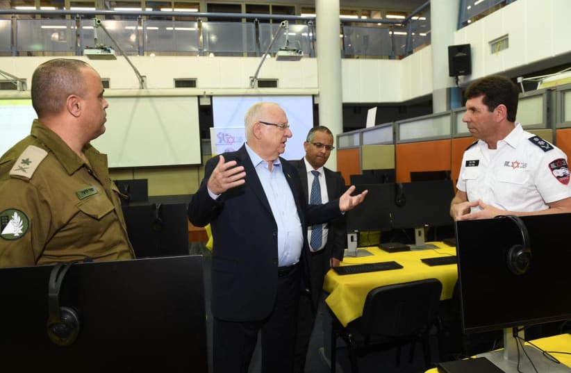 Israeli President Reuven Rivlin at opening of MDA's new auxilliary call center in Ramla. March 13, 2020 (photo credit: COURTESY MDA)