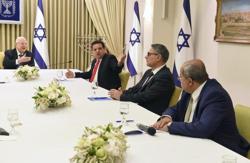 President Reuven Rivlin meets with representatives of the Joint List on March 15, 2020 (photo credit: Mark Neiman/GPO)