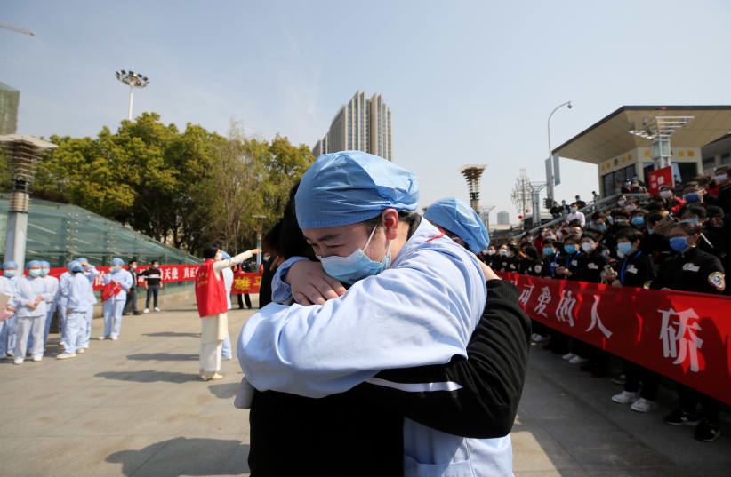 CHINA PIONEERED the struggle against the virus. (photo credit: REUTERS)
