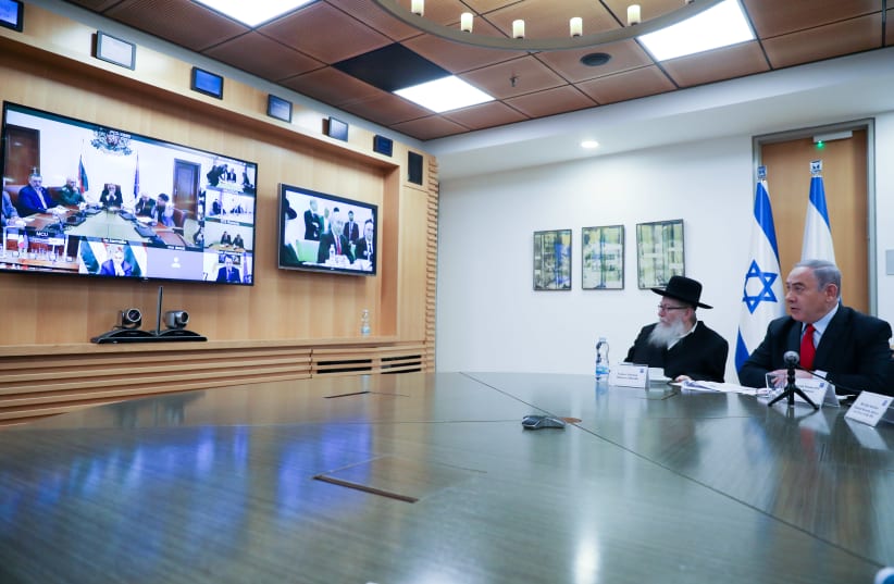 In a bid to stop the spread of the novel coronavirus, Prime Minister Benjamin Netanyahu and Health Minister Yaakov Litzman took part in a video conference with European officials on March 9. (photo credit: MARC ISRAEL SELLEM)