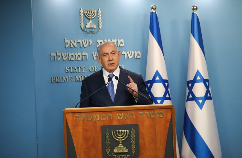 Prime Minister Benjamin Netanyahu threatened of a total lockdown as coronavirus infects 2,369 Israelis (photo credit: AMOS BEN-GERSHOM/GPO)