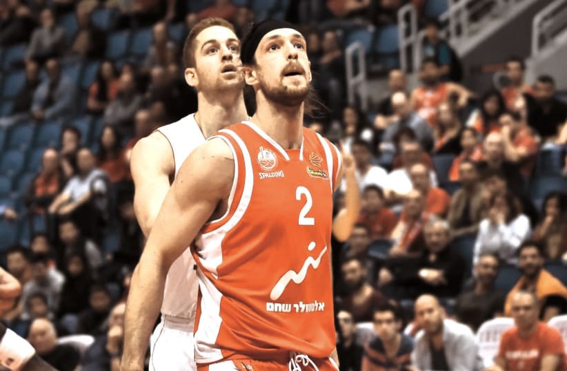 Ben Eisenhardt misses banging down low on the basketball court, but the Hapoel Beersheba center is optimistic the local season will resume at some point after the coronovirus is under control. (photo credit: DOV HALICKMAN PHOTOGRAPHY)
