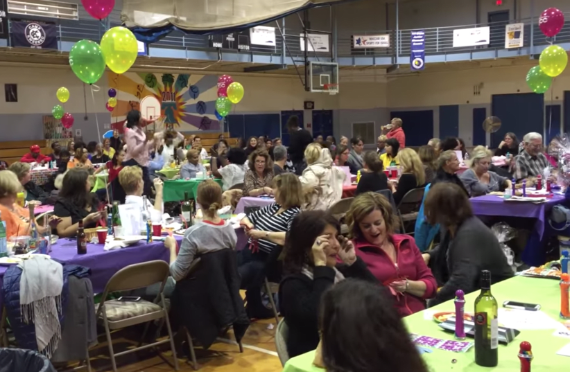 A bingo game at the Kaiserman JCC outside Philadelphia in 2015. This week, nearly all of its employees were laid off due to the coronavirus (photo credit: SCREENSHOT FROM YOUTUBE/JTA)
