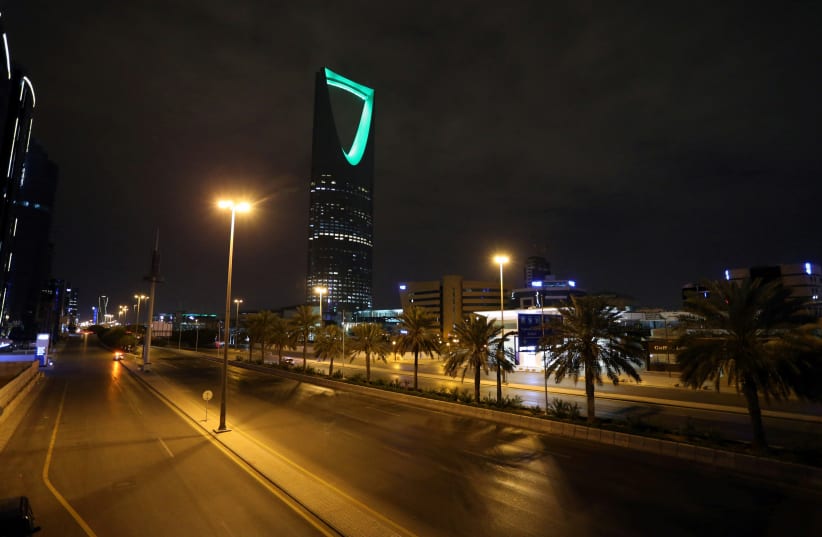 A general view shows an empty street after a curfew was imposed to prevent the spread of the coronavirus disease (COVID-19), in Riyadh, Saudi Arabia March 24, 2020. Picture taken March 24, 2020 (photo credit: AHMED YOSRI/ REUTERS)