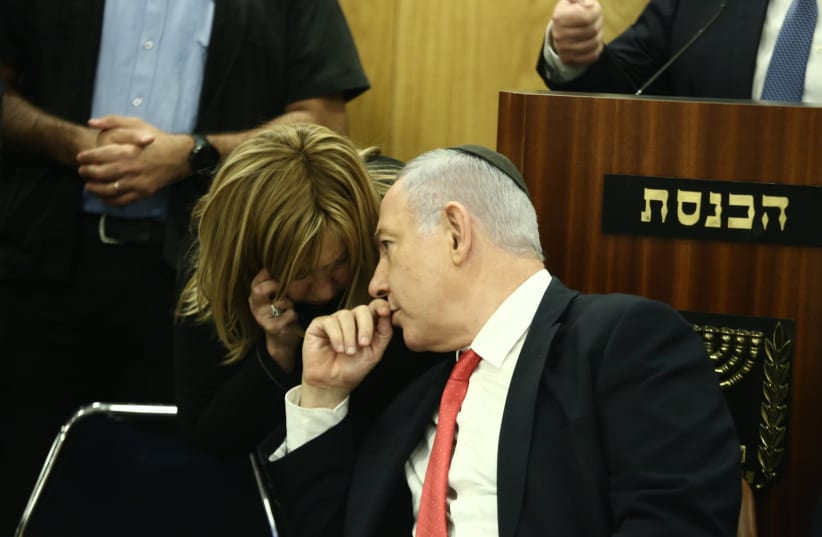 PM Benjamin Netanyahu with parliamentary adviser Rivka Paluch, who tested positive for the coronavirus (photo credit: Courtesy)