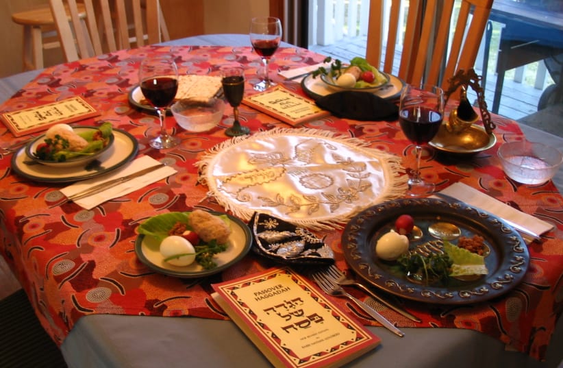 A SUGGESTION for the Seder: Leave an empty chair at the table for the person who cannot attend, but at the empty place setting, includes items they would have brought. (photo credit: Courtesy)
