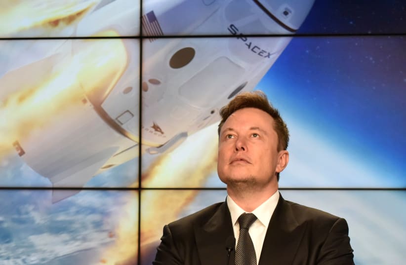SpaceX founder and chief engineer Elon Musk attends a post-launch news conference to discuss the SpaceX Crew Dragon astronaut capsule in-flight abort test at the Kennedy Space Center (photo credit: REUTERS)