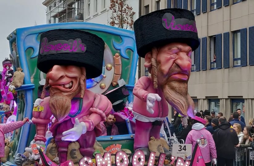 A float featuring antisemitic caricatures at the Aalst Carnival parade in Belgium on March 2 (photo credit: FJC)