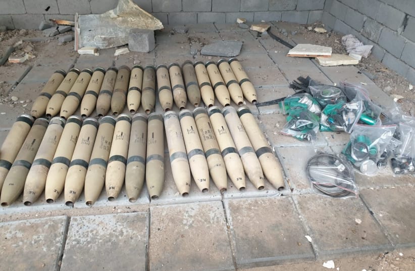 Unused Katyusha rockets found by the Iraqi Army are seen in Umm al-Izam (photo credit: IRAQI MEDIA SECURITY CELL/HANDOUT VIA REUTERS)