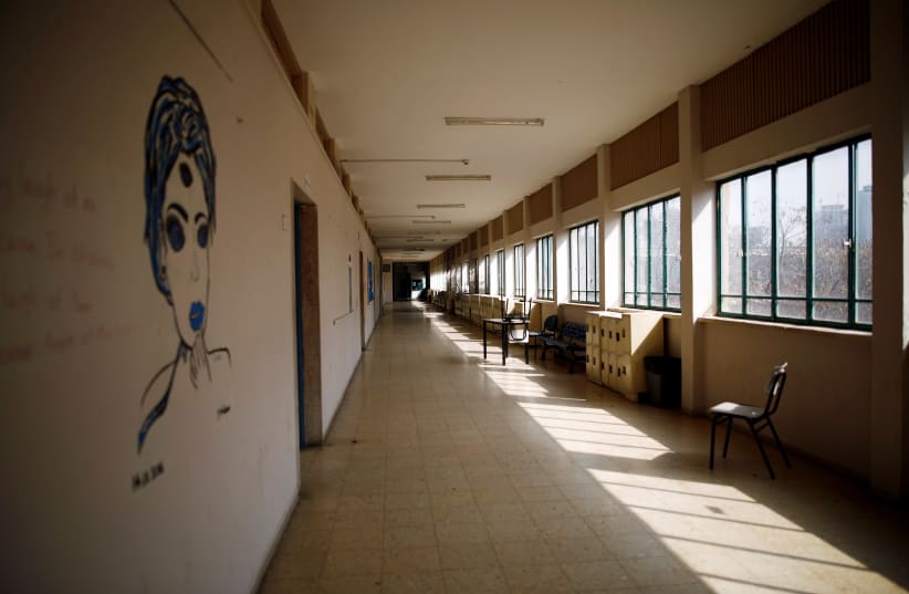 An empty school is seen after Israel shut schools as part of precautionary measures against coronavirus, in Tel Aviv, Israel March 15, 2020 (photo credit: CORINNA KERN/REUTERS)