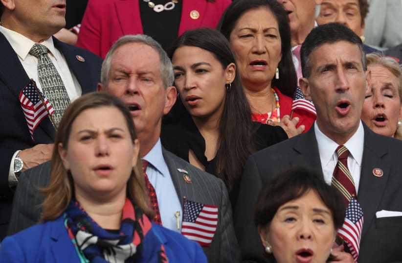 Irving Berlin composed ‘God Bless America.’ (Pictured: Members of the US House of sing ‘God Bless America’ at the US Capitol on September 11, 2019 (photo credit: REUTERS)