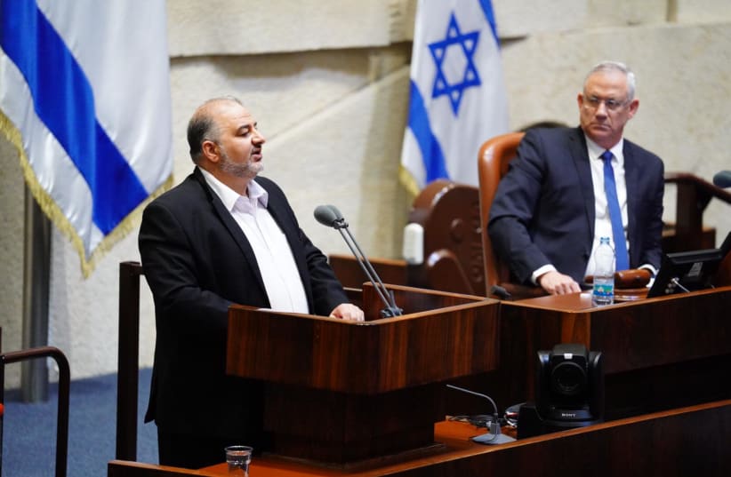 Joint List MK Mansour Abbas alongside Blue and White leader Benny Gantz on Holocaust Remembrance Day, 2020 (photo credit: KNESSET SPOKESWOMAN - ADINA WALLMAN)