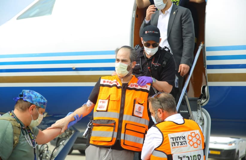 United Hatzalah's President and Founder Eli Beer returns to Israel after recovering from coronavirus (photo credit: SHIRA HERSHKOPF/UNITED HATZALAH)