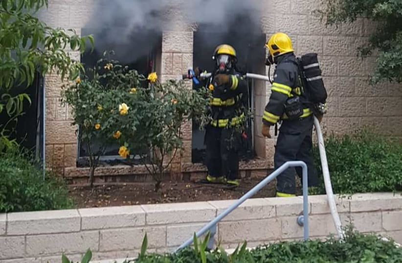 Firefighters fighting the fire at Jerusalem's City Hall on April 22 2020 (photo credit: FIRE AND RESCUE SERVICE)
