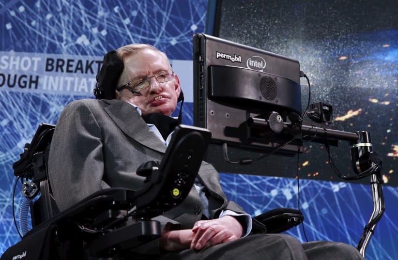 Physicist Stephen Hawking sits on stage during an announcement of the Breakthrough Starshot initiative with investor Yuri Milner in New York April 12, 2016.  (photo credit: LUCAS JACKSON/REUTERS)