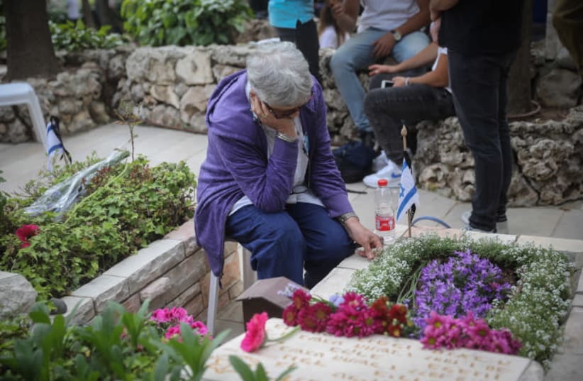 MOURNING AT Jerusalem’s Mount Herzl military cemetery on Memorial Day, on May 8, 2019 (photo credit: HADAS PARUSH/FLASH90)