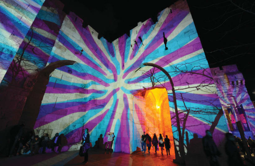 THE MOVEMENT for Quality Government was barred from projecting a political message on the Old City walls. Pictured: A Hanukkah light show that was welcomed on the walls.  (photo credit: MENDY HECHTMAN/FLASH90)