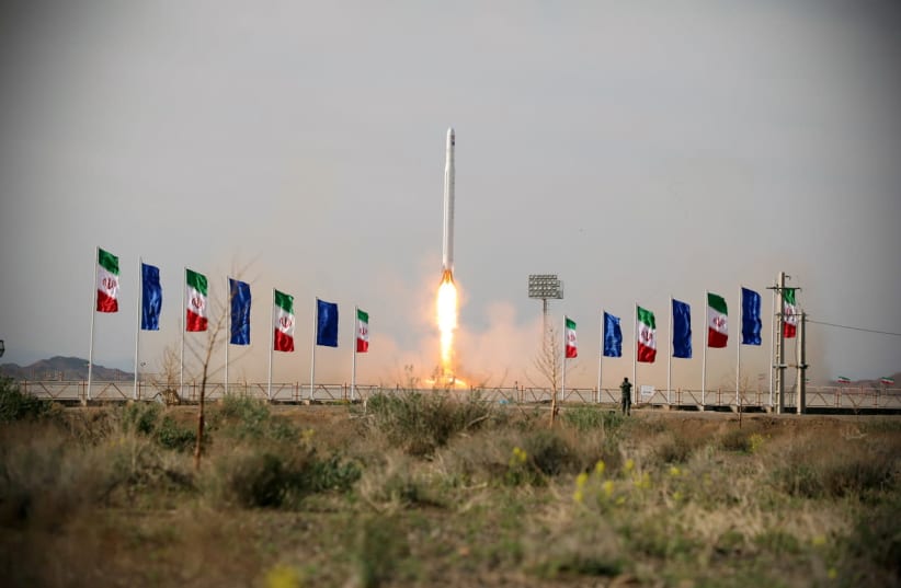Iran launches a military satellite in April 2020 (photo credit: REUTERS)