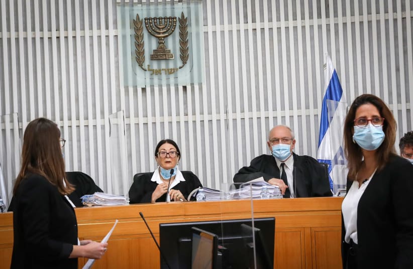Israeli Supreme Court President Esther Hayut and Supreme court Justices arrive to a court session on petitions filed against the proposed government at the Supreme Court in Jerusalem on May 3, 2020 (photo credit: YOSSI ZAMIR)