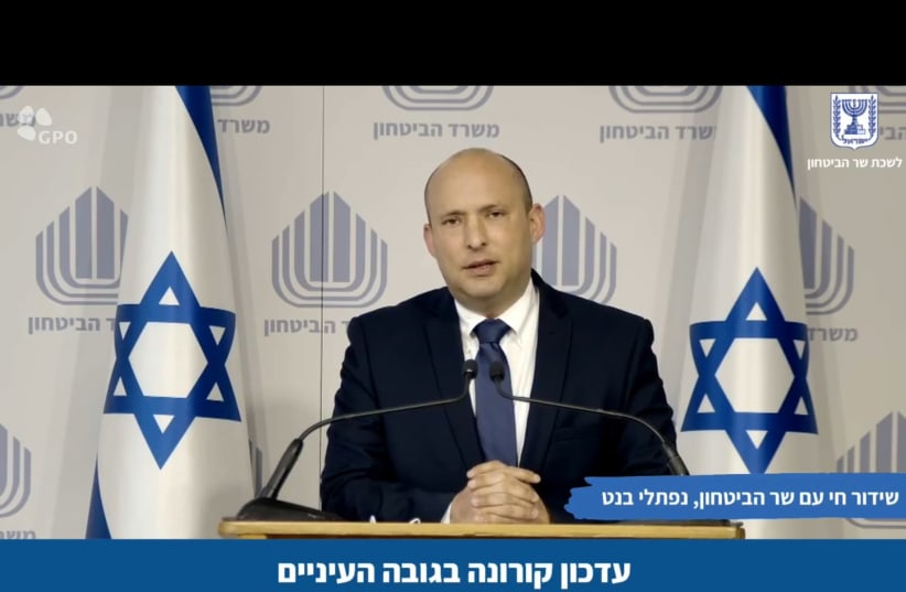 Defense Minister Naftali Bennett holding a briefing online on Sunday (photo credit: screenshot)