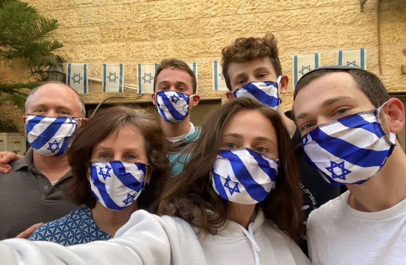 Coronavirus face masks in the pattern of the Israeli flag (photo credit: NINA BRODER)
