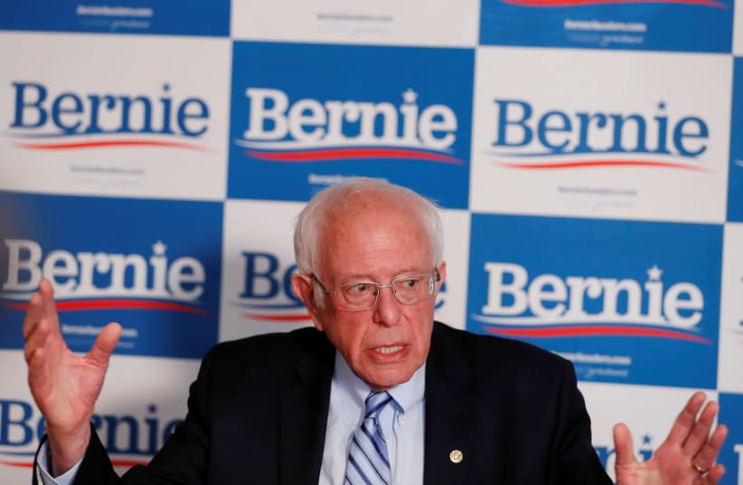Bernie Sanders responds to a question from a reporter  (photo credit: LUCAS JACKSON / REUTERS)
