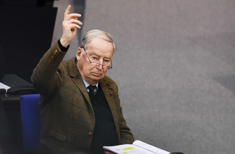 Alternative for Germany (AfD) leader Alexander Gauland raises his arm during a plenum session at the lower house of parliament, Bundestag, in Berlin, Germany March 13, 2020 (photo credit: ANNEGRET HILSE / REUTERS)