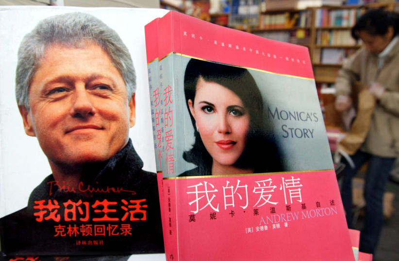 Former US president Bill Clinton's autobiography and former White House intern Monica Lewinsky's "Monica's Story" are displayed at a book fair in Beijing. Former US president Bill Clinton's autobiography and former White House intern Monica Lewinsky's "Monica's Story" are displayed at a book fair in (photo credit: REUTERS/GUANG NIU)