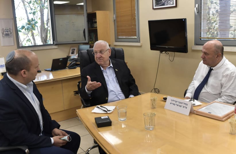 From Left to Right, Defense Minister Naftali Bennett, President Reuven Rivlin, Director of the IIBR Shmuel Shafira   (photo credit: KOBI GIDEON/GPO)