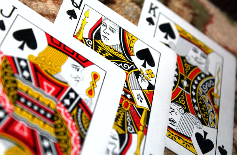 King, Queen and Jack playing cards (photo credit: PEXELS)