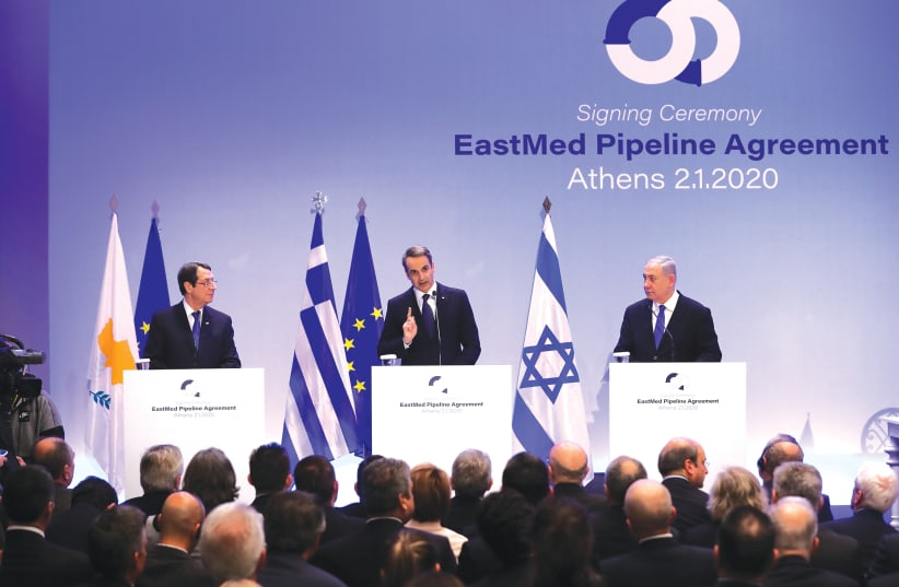 CYPRIOT PRESIDENT Nicos Anastasiades, Greek Prime Minister Kyriakos Mitsotakis and Prime Minister Benjamin Netanyahu attend a joint news conference following the signing of a deal to build the EastMed sub-sea pipeline to carry natural gas from the eastern Mediterranean to Europe, in Athens earlier t (photo credit: REUTERS)
