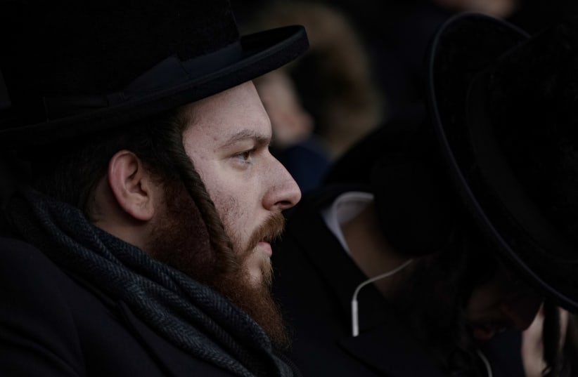 Orthodox Jews take part in the 13th Siyum HaShas at the MetLife Stadium in East Rutherford, New Jersey, U.S., January 1, 2020 (photo credit: JEENAH MOON/REUTERS)