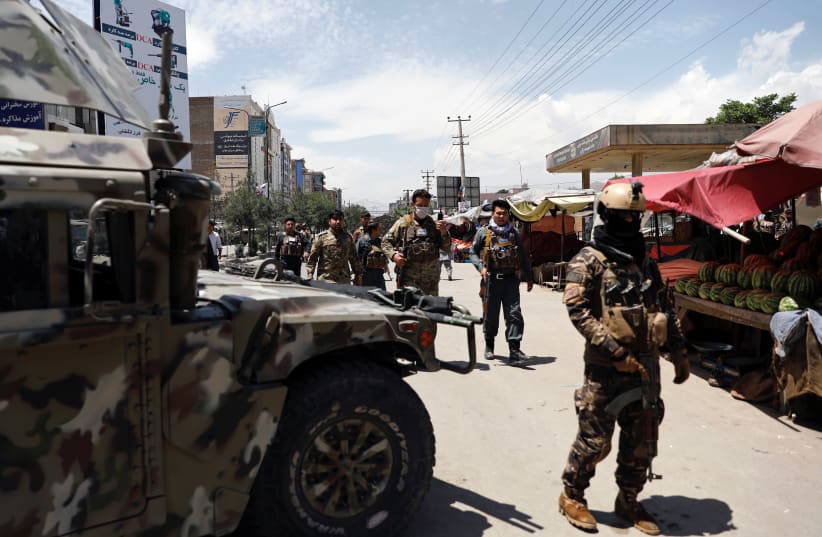 Afghan security forces arrive at the site of an attack in Kabul (photo credit: REUTERS)