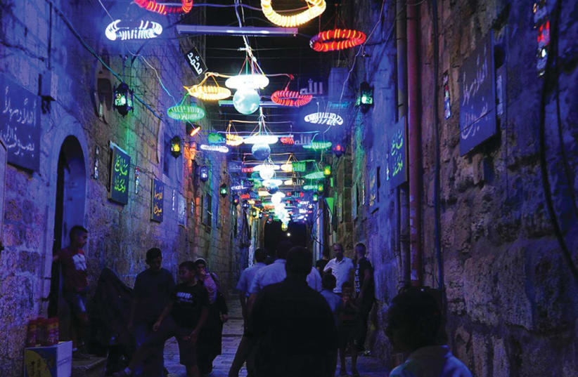 THE OLD City comes alive at night during Ramadan. (photo credit: DANCU ARNON/NATIONAL LIBRARY)