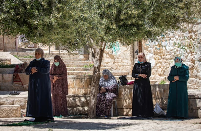 MUSLIM WOMEN pray in the Old City on May 1, during Ramadan. (photo credit: OLIVIER FITOUSSI/FLASH90)