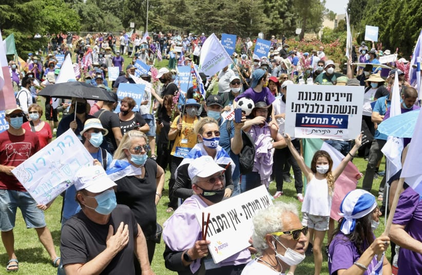 Tourism industry workers  protest outside the Knesset and Finance Ministry on May 14, 2020 (photo credit: MARC ISRAEL SELLEM)