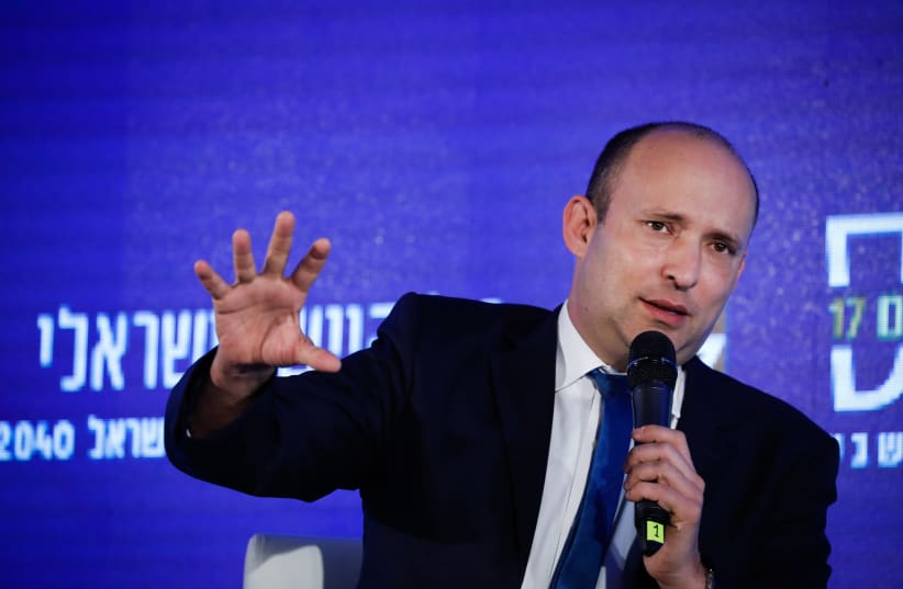 Israeli minister of Defense Naftali Bennett speaks at the 17th annual Jerusalem Conference of the 'Besheva' group, on February 24, 2020 (photo credit: OLIVIER FITOUSSI/FLASH90)
