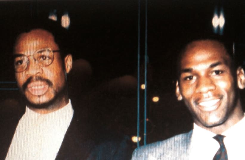 A young Gene Banks (left) poses with Michael Jordan (right) while both were in the NBA with the Chicago Bulls in the mid-1980s (photo credit: Courtesy)