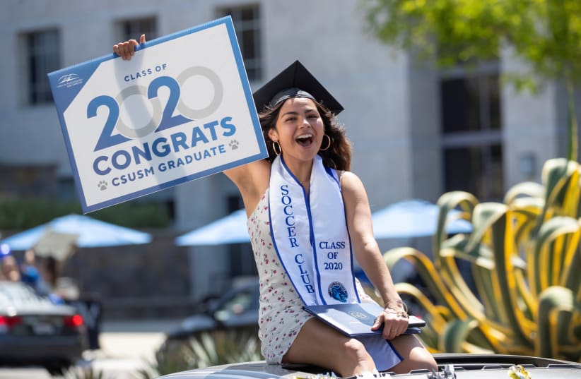 College graduation during the outbreak of the coronavirus disease (COVID-19) in California (photo credit: REUTERS/MIKE BLAKE)