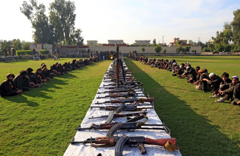 ISIS militants who surrendered to the Afghan government are presented to media in Jalalabad, Nangarhar province, Afghanistan November 17, 2019 (photo credit: REUTERS/PARWIZ)